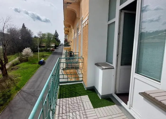 Balconies Above Colonnade Apartment